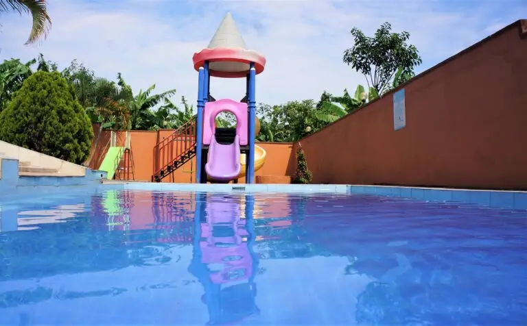 Relaxing by the pool at ATACO Country Resort, one of the hotels with swimming pools in Fort Portal.