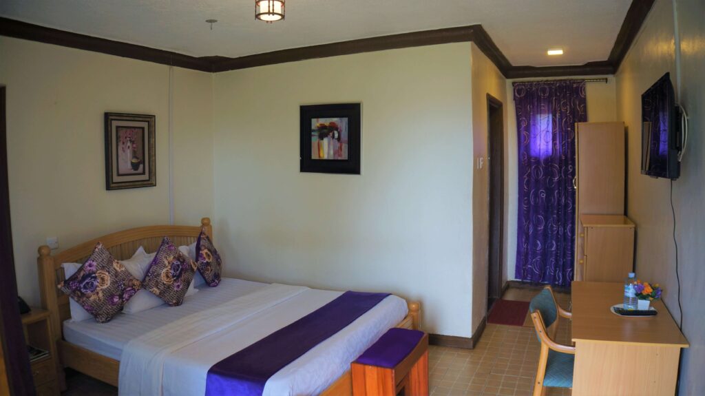 book-fort portal-hotel-ataco country resort-acommodation-tourist attraction-family-room-cottage